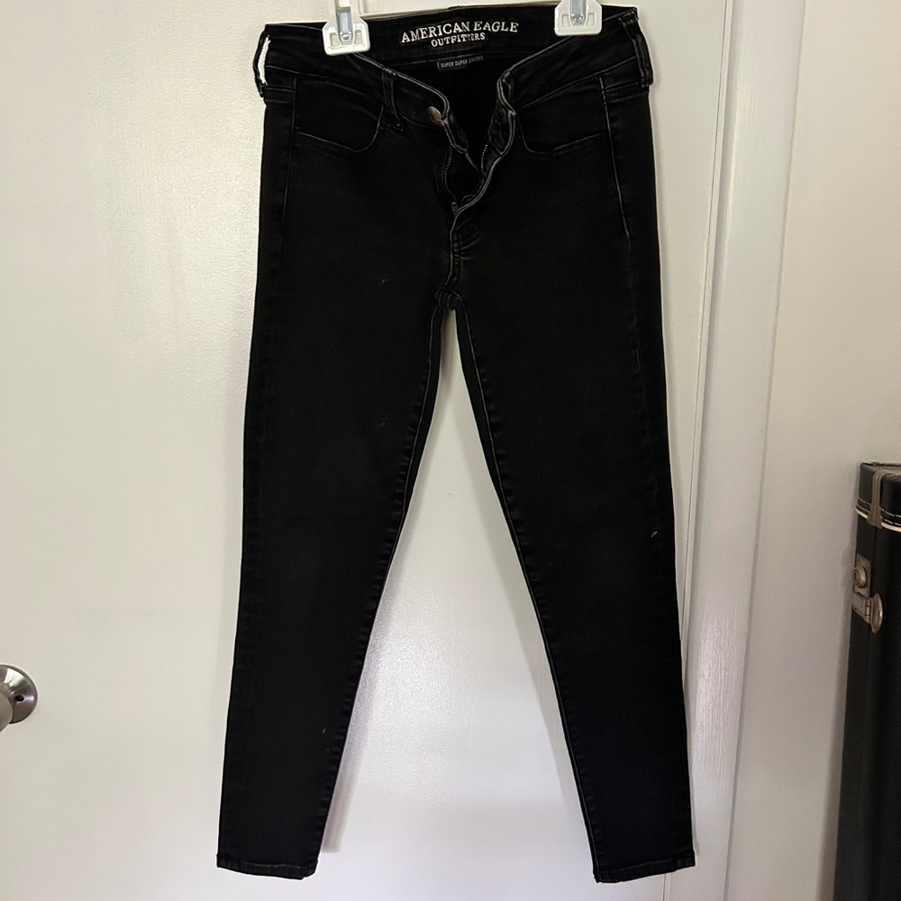 American Eagle, black skinny jeans.